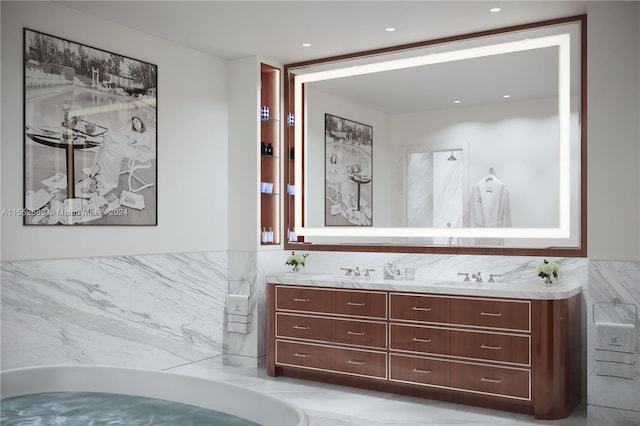 bathroom with vanity and a shower