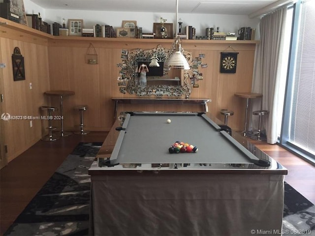 playroom featuring plenty of natural light, pool table, and dark hardwood / wood-style flooring