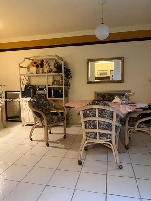 view of tiled dining space