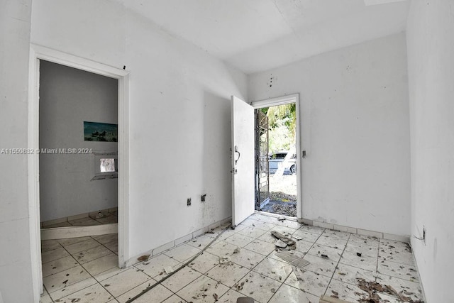 empty room featuring light tile floors