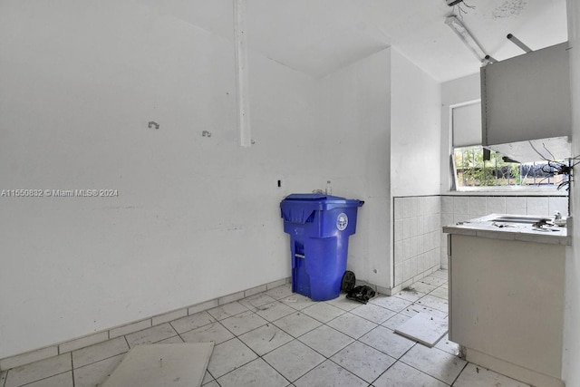 bathroom with vanity and tile flooring