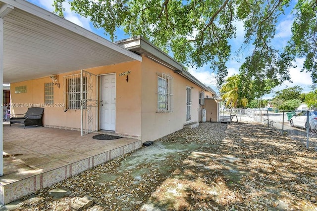 view of home's exterior with a patio