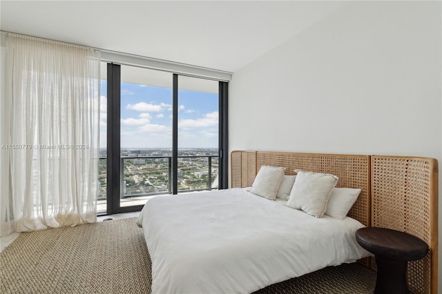 bedroom with floor to ceiling windows