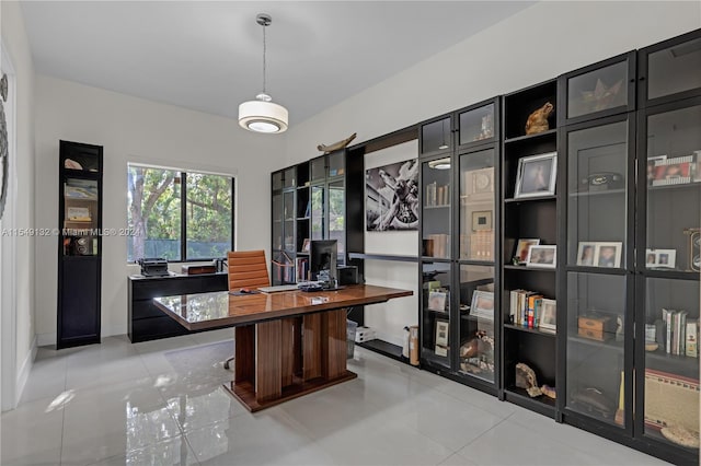 home office with light tile flooring