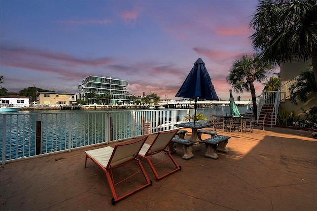 view of patio terrace at dusk