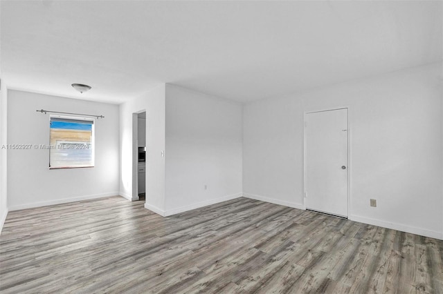 empty room featuring light wood-type flooring