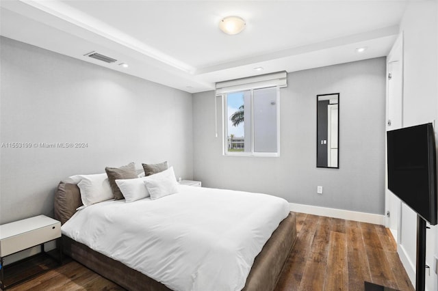 bedroom with wood-type flooring