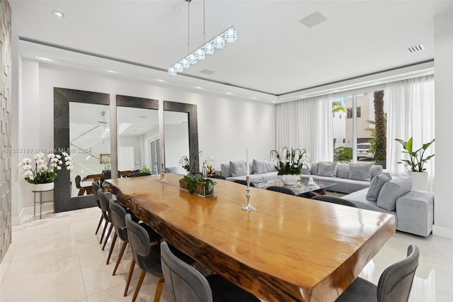 dining area with light tile floors