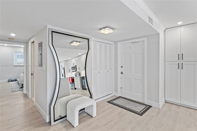 foyer featuring light hardwood / wood-style floors