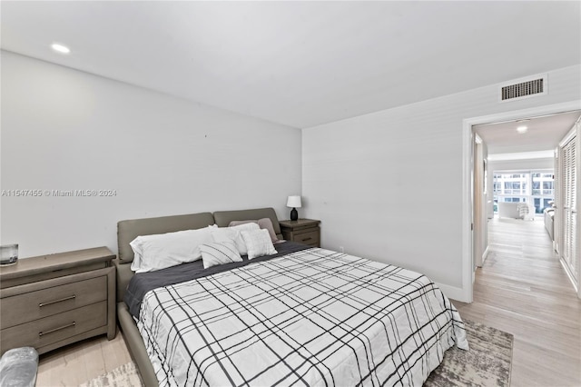 bedroom featuring light hardwood / wood-style floors