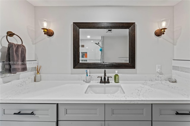 bathroom with vanity with extensive cabinet space