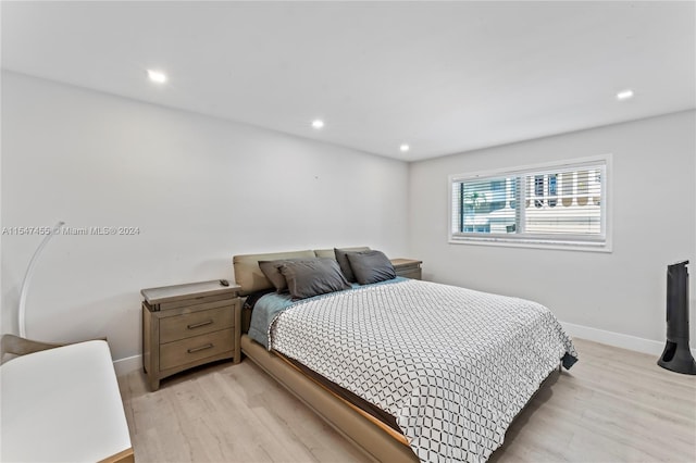 bedroom with light wood-type flooring