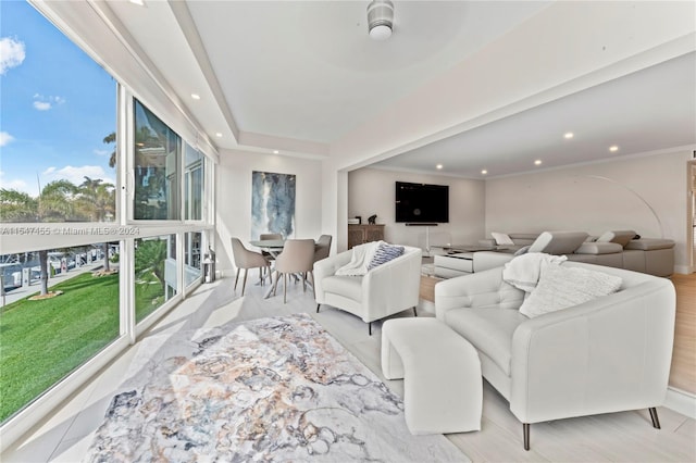 living room with a healthy amount of sunlight and light wood-type flooring