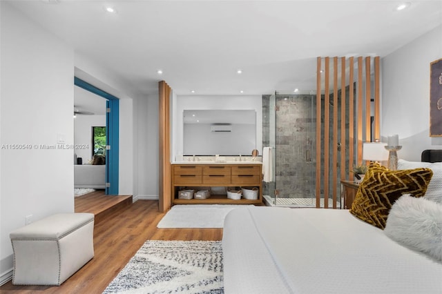 bedroom featuring light wood-type flooring