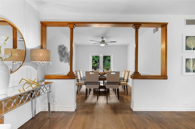 dining area with ceiling fan and dark hardwood / wood-style flooring