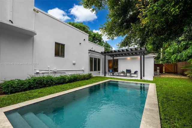 exterior space with a yard, a fenced in pool, a patio area, and a pergola