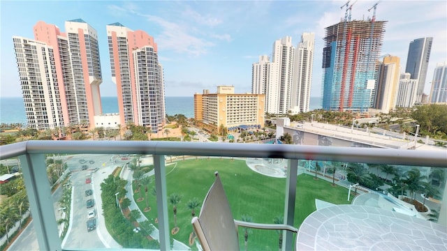 balcony featuring a water view