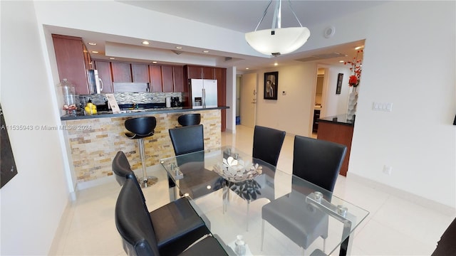 view of tiled dining room