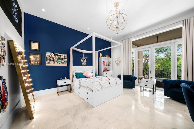 bedroom featuring an inviting chandelier