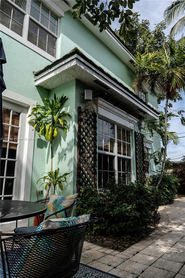 view of property exterior featuring a patio