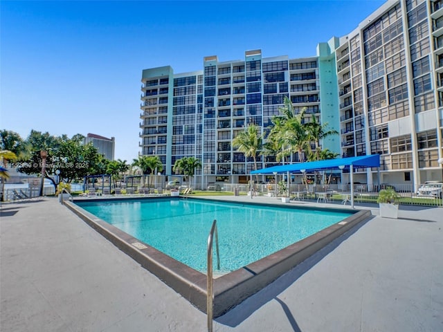 view of swimming pool featuring a patio area