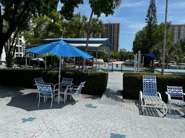 view of terrace with a pool