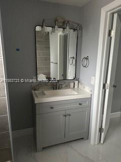 bathroom featuring vanity and tile floors