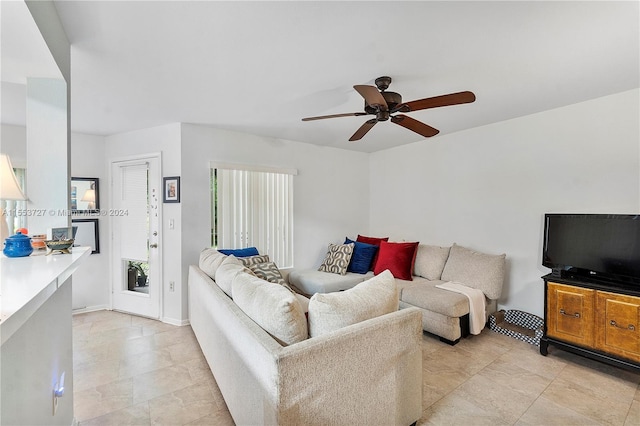 kitchen with white cabinets, white appliances, sink, kitchen peninsula, and ceiling fan