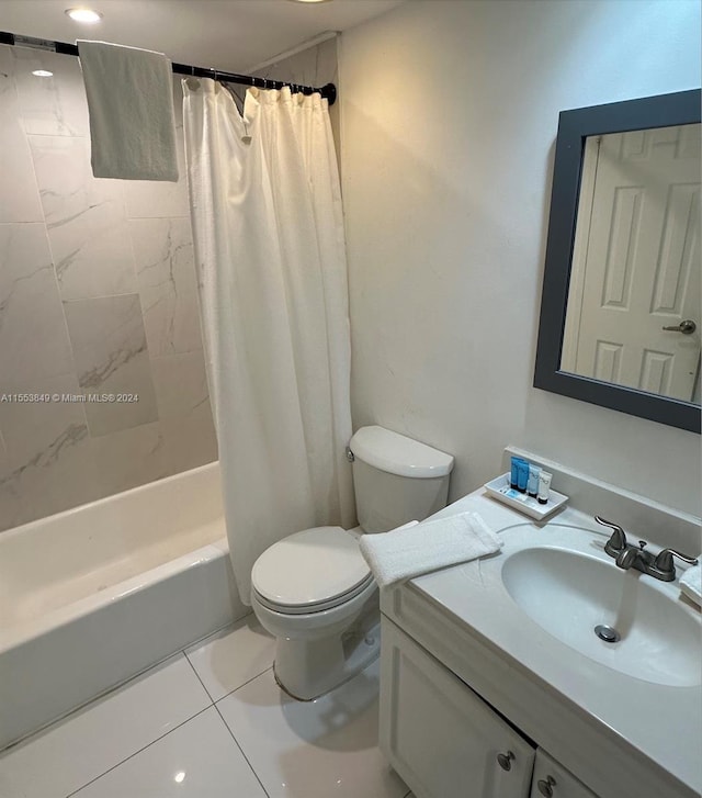 full bathroom with toilet, shower / bath combo with shower curtain, vanity, and tile flooring