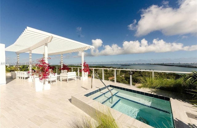 view of swimming pool featuring an in ground hot tub, a pergola, and a patio