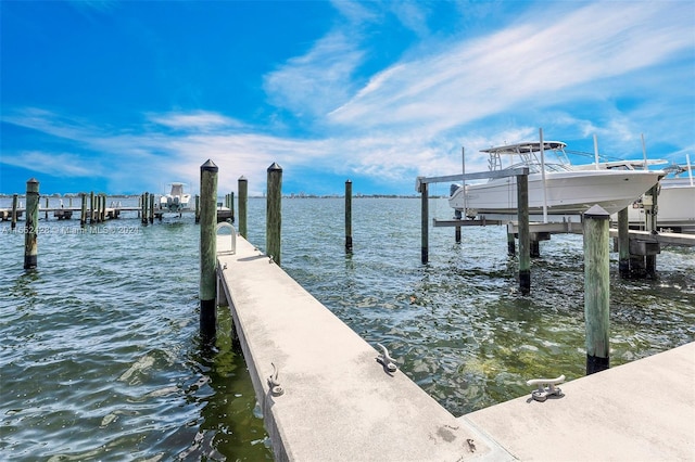 view of dock with a water view