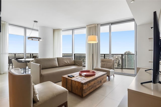 tiled living room with a wall of windows