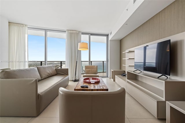 tiled living room with floor to ceiling windows