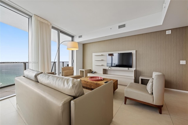 living room featuring light tile floors