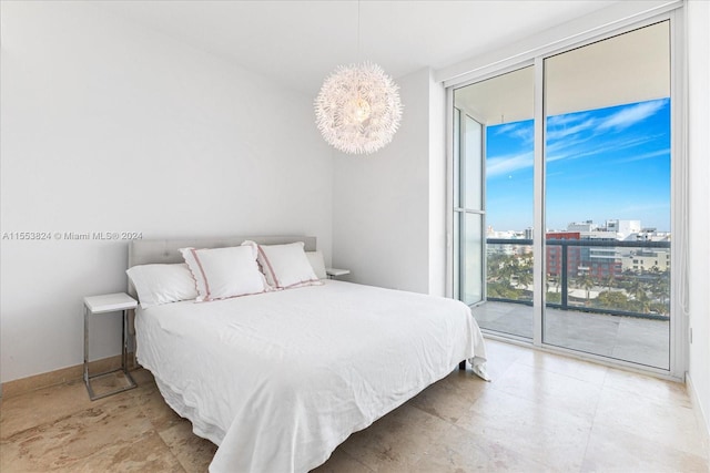 tiled bedroom featuring access to exterior