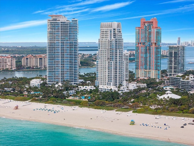 property's view of city with a beach view and a water view