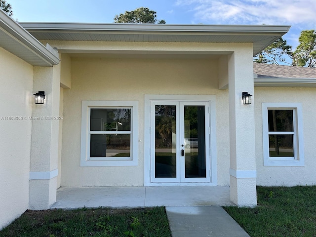 view of exterior entry with french doors