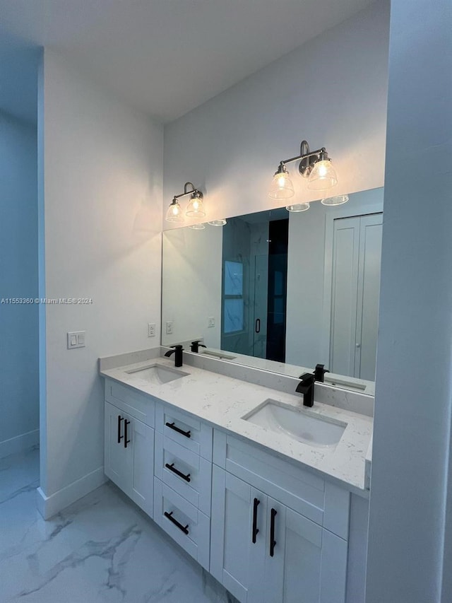 bathroom with double sink and large vanity