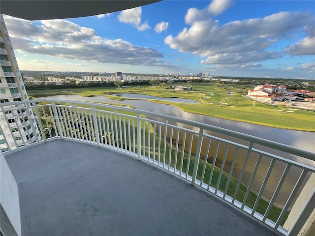 balcony featuring a water view