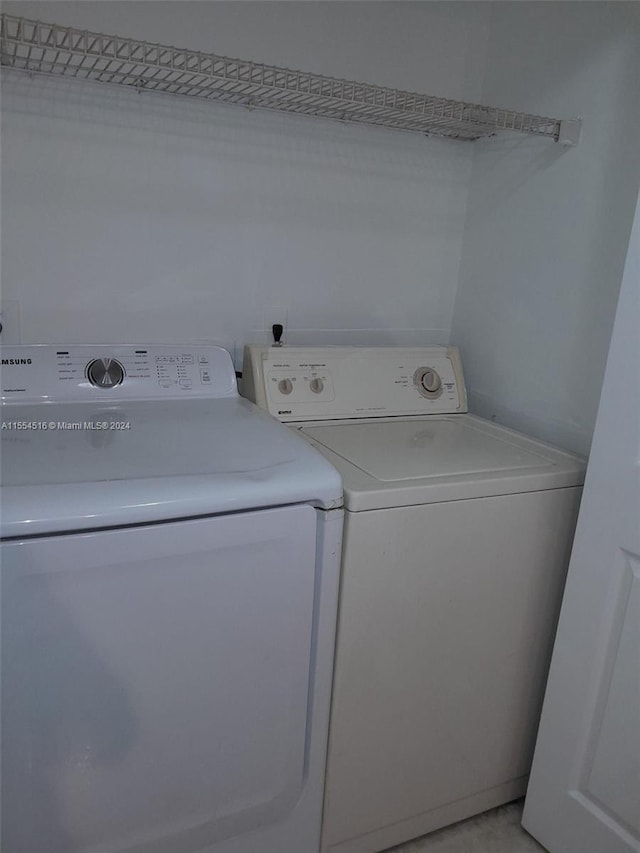 laundry area with washer and dryer