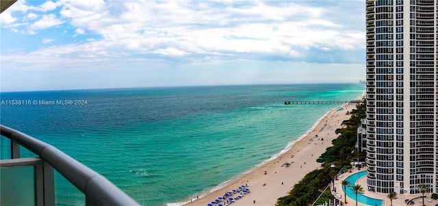 view of water feature with a beach view