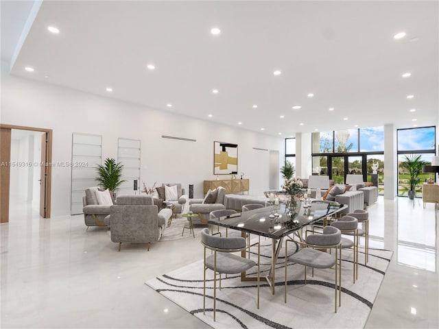 dining area with floor to ceiling windows