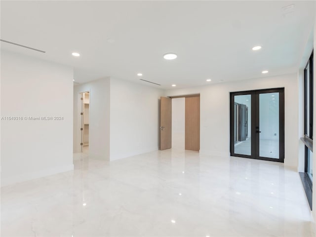 empty room featuring french doors