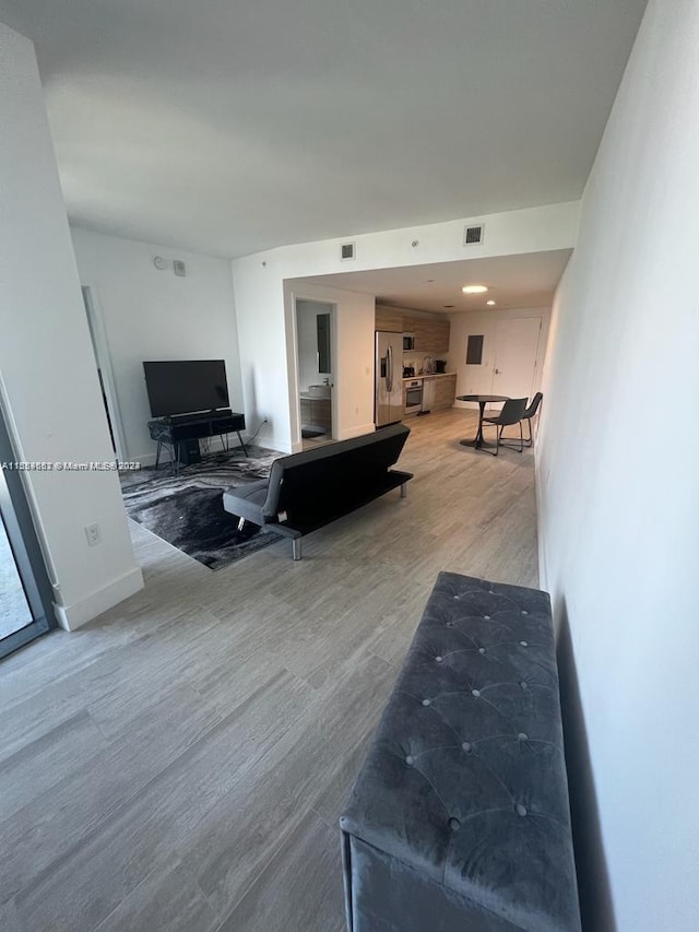 living room featuring light wood-type flooring