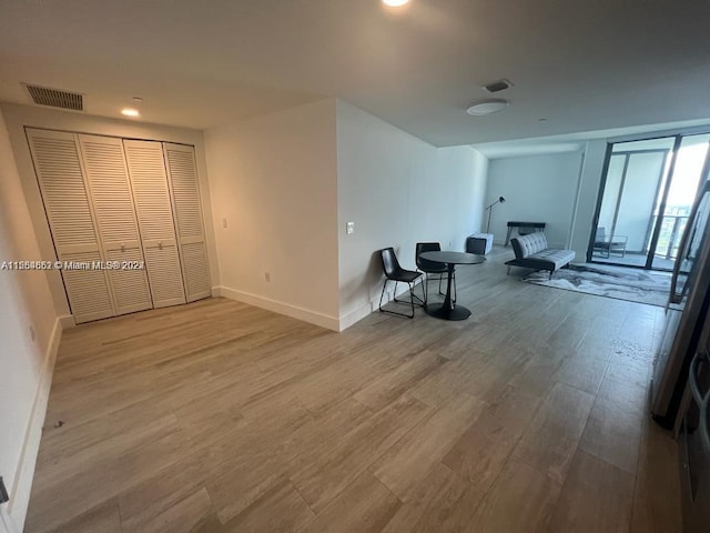 interior space with light hardwood / wood-style floors