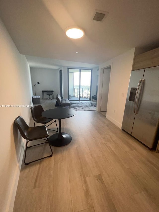 sitting room with light wood-type flooring