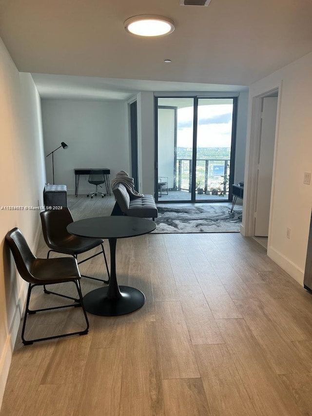 living area with light wood-type flooring