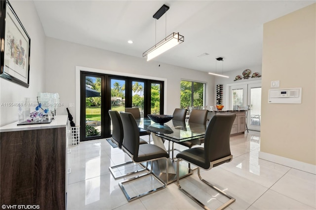 dining room with french doors and light tile floors