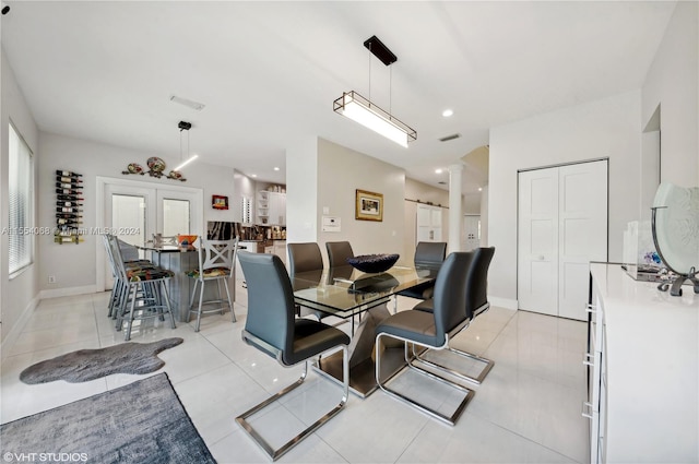 tiled dining area with french doors