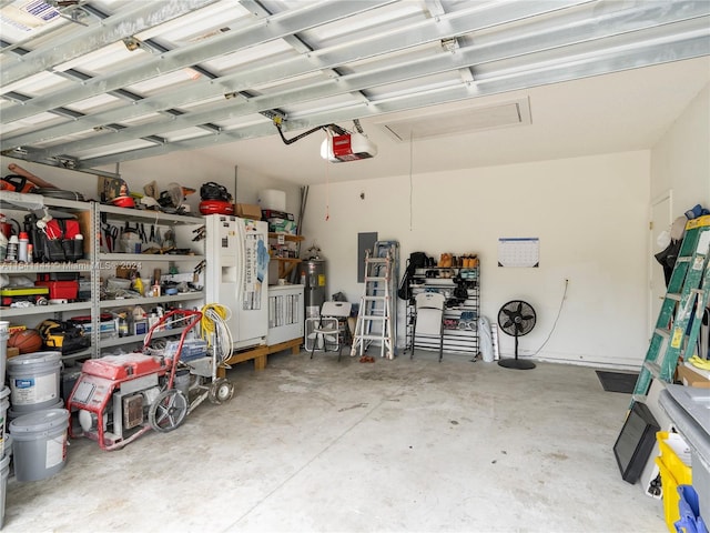 garage featuring white fridge with ice dispenser, electric water heater, and a garage door opener